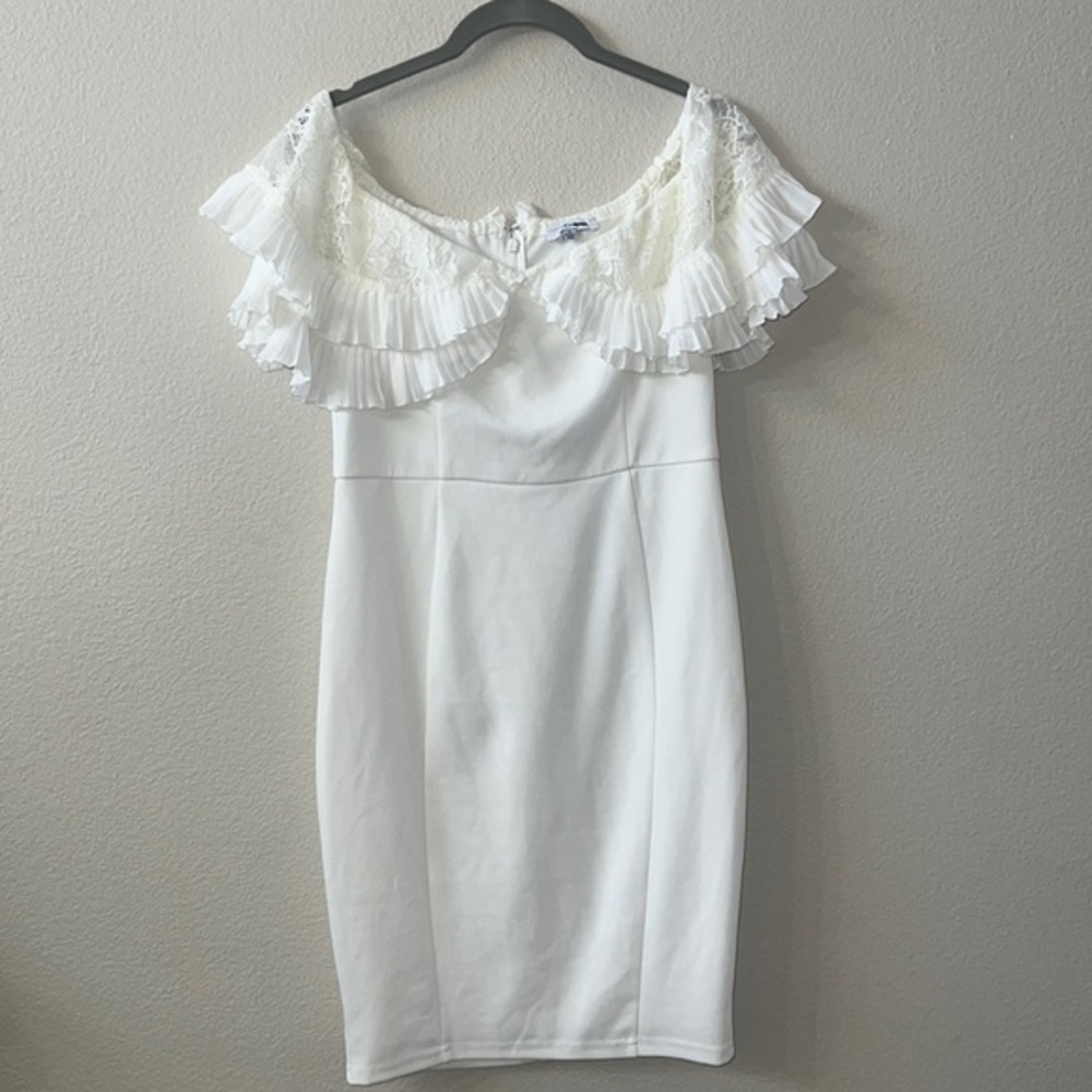 Fashion Nova white body con dress with ruffle sleeves. Size medium. EUC